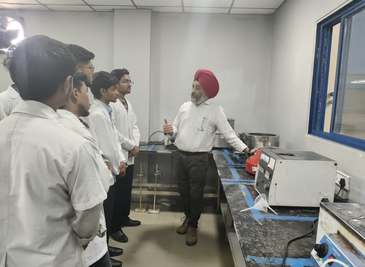 Group photo of B.Pharm students at Pious Laboratories, Indore